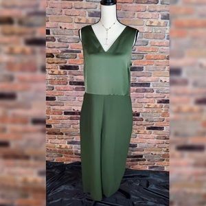 Olive green Banana Republic jumpsuit /peekaboo twist back. Brand new.